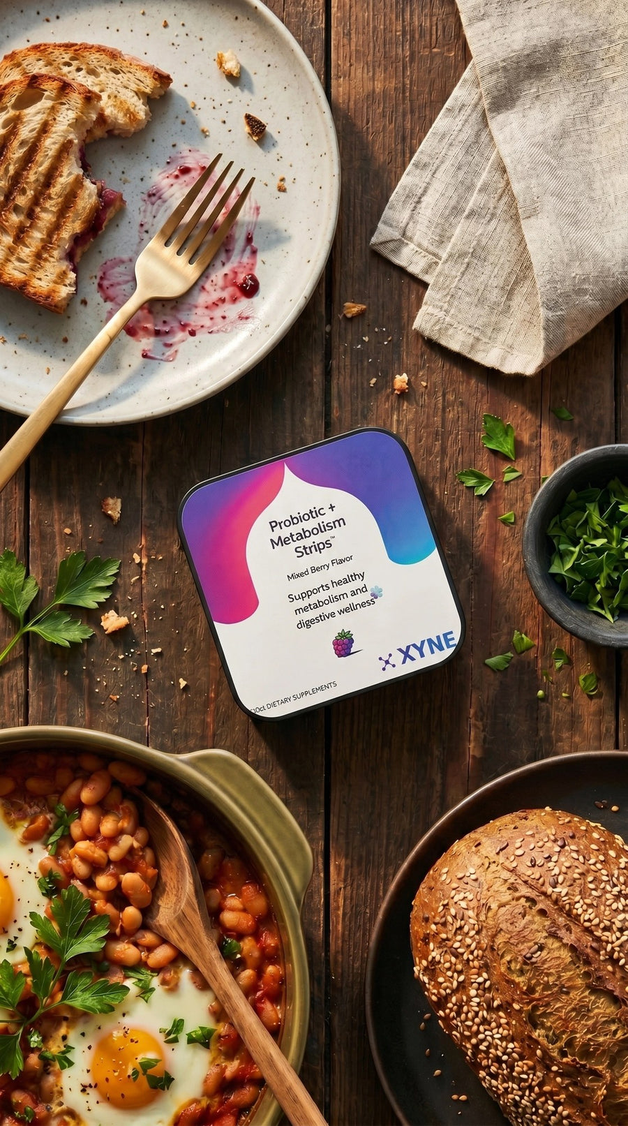 XYNE Probiotic + Metabolism Strips — open tin with strips