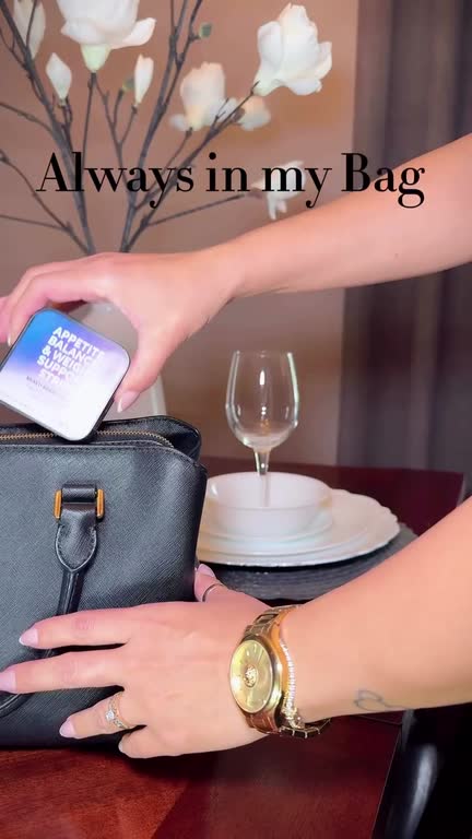 The Appetite Balance tin goes into a handbag, then a strip is taken from its sachet at a laid table