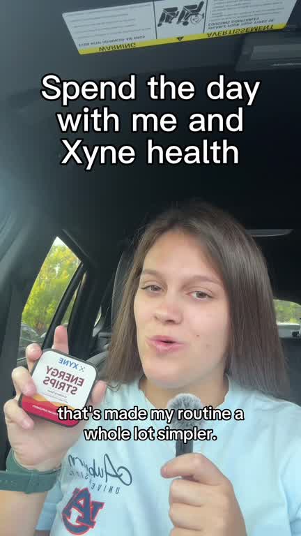 A student holds up the Energy Strips tin, walks across campus, then places a strip on her tongue